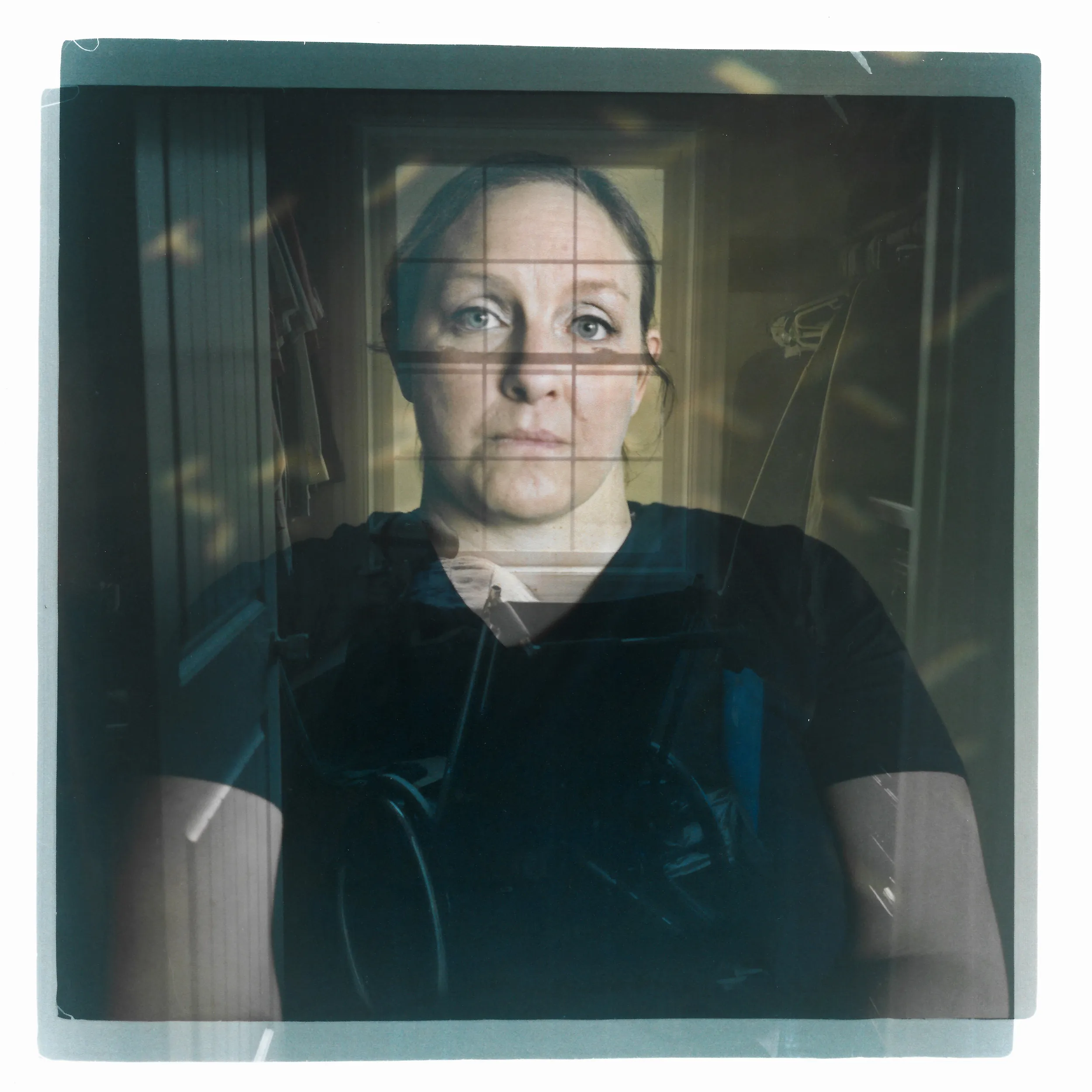 A double exposure made from a headshot of Missy Jenkins Smith layered with a photo of her wheelchair. 