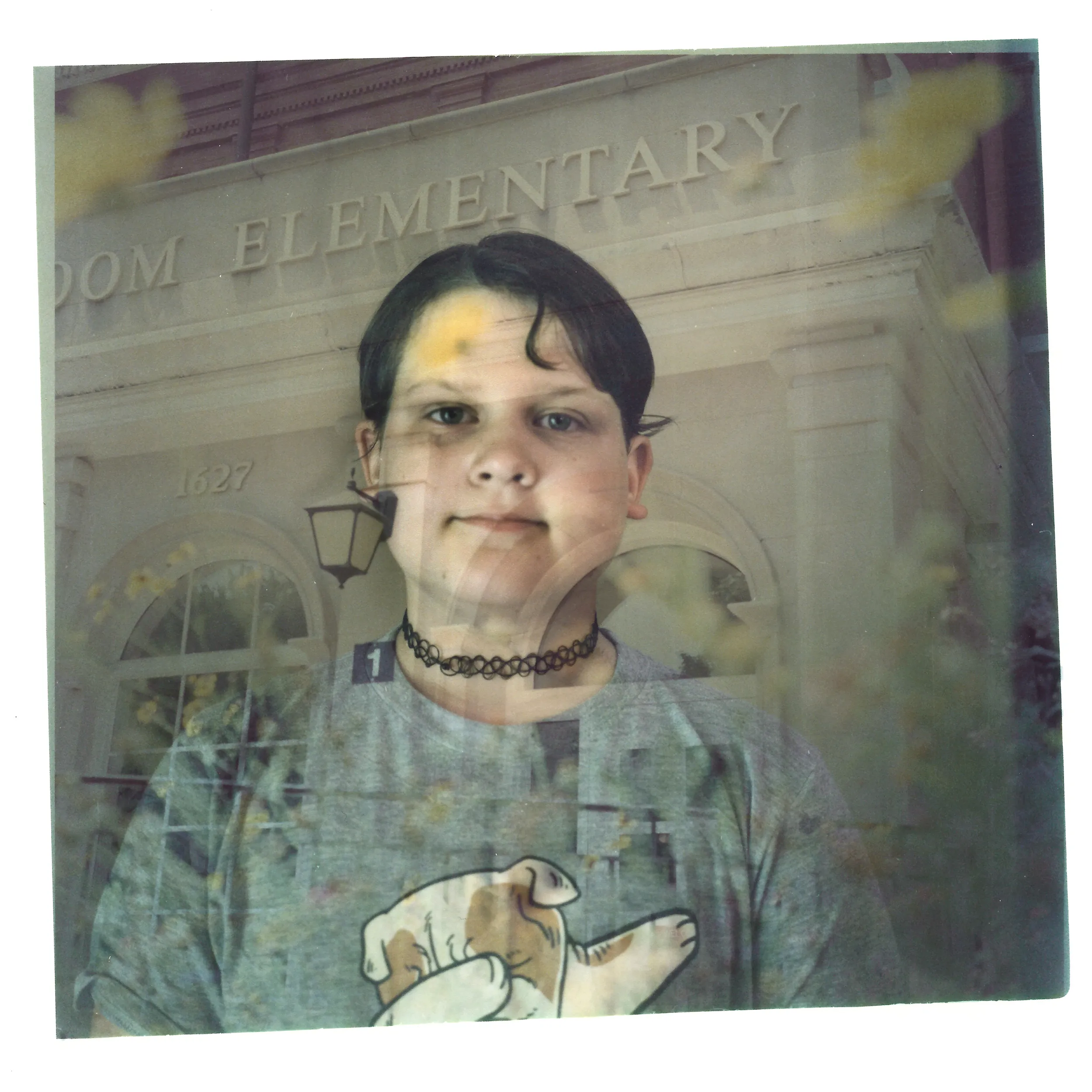 A double exposure made from a headshot of Sylvia Holm layered with a photo of an elementary school. 