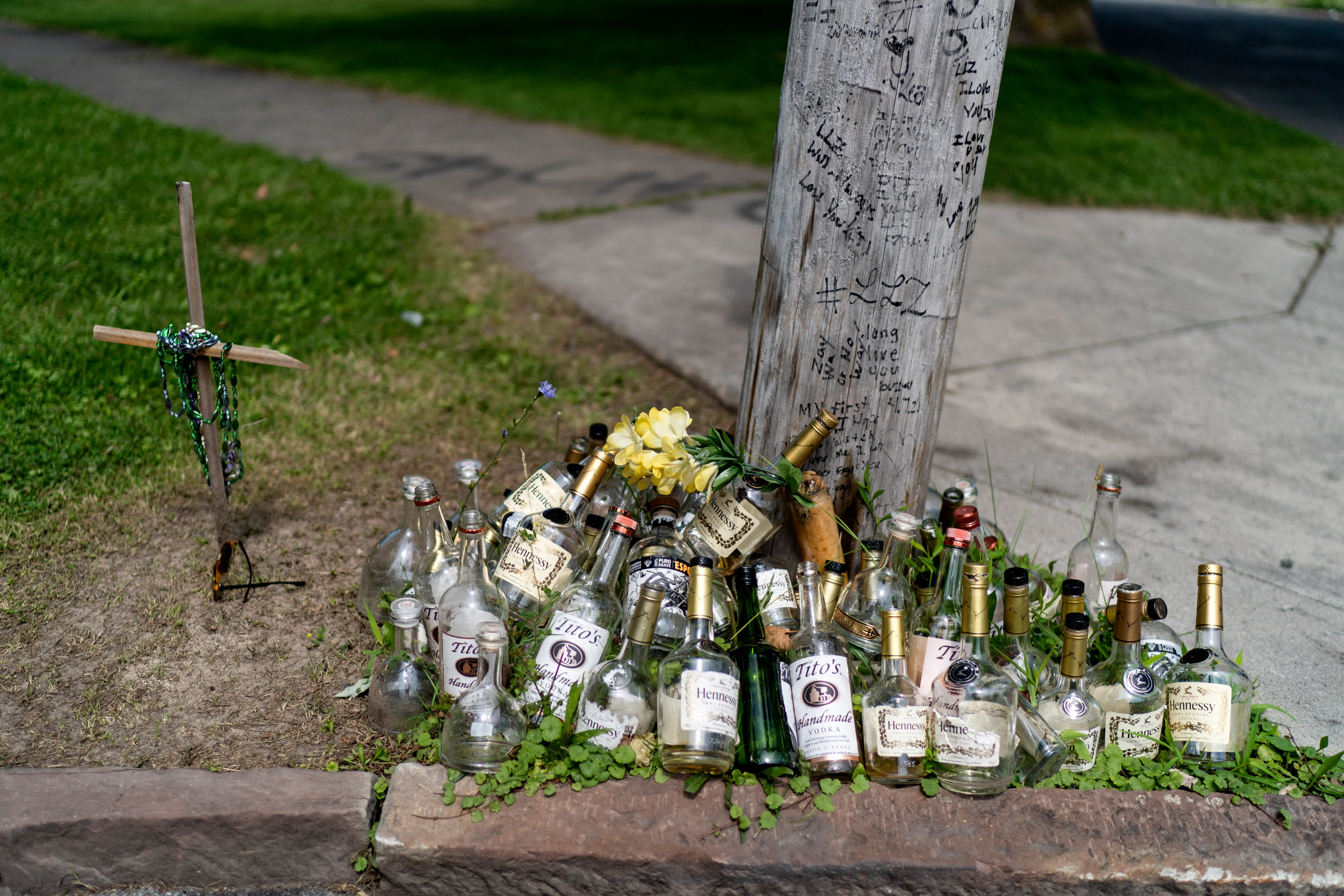 A memorial made of a pile of bottles.