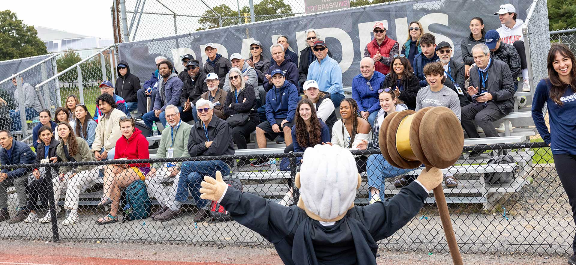 The Judge mascot gets the crowd in the bleachers excited