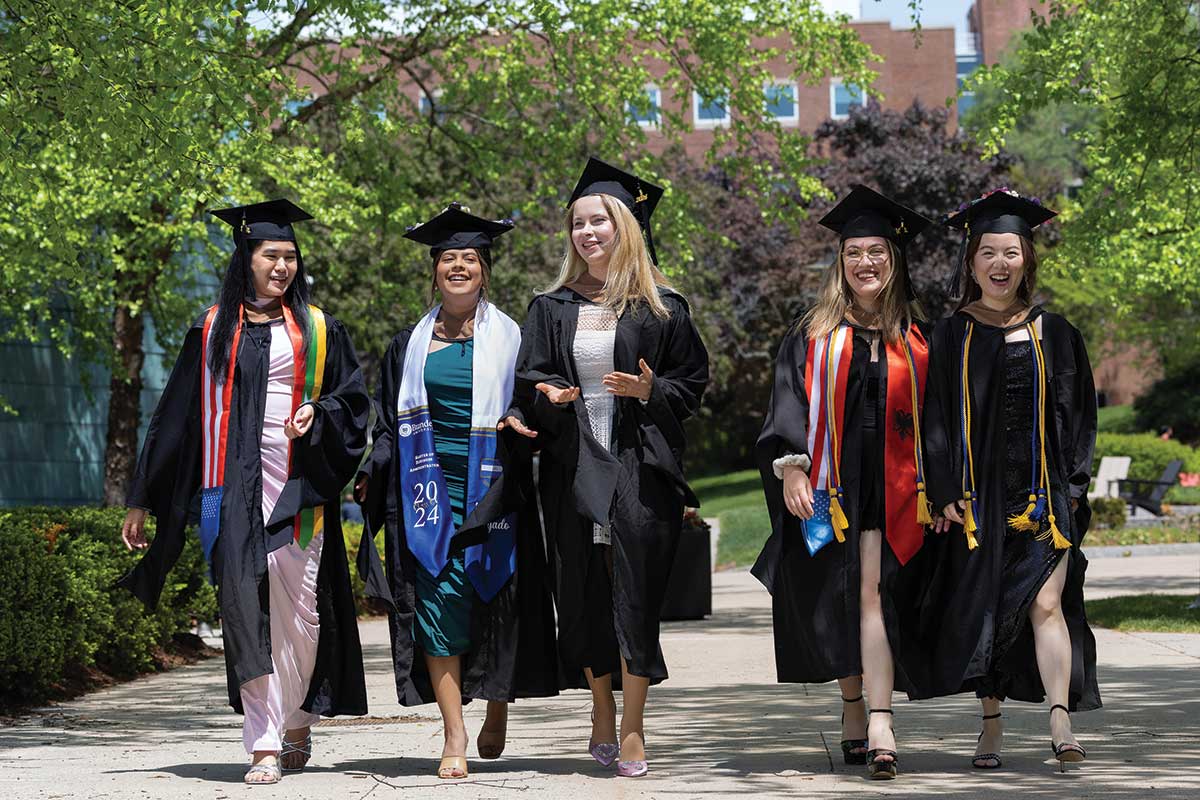 Graduates walking on campus