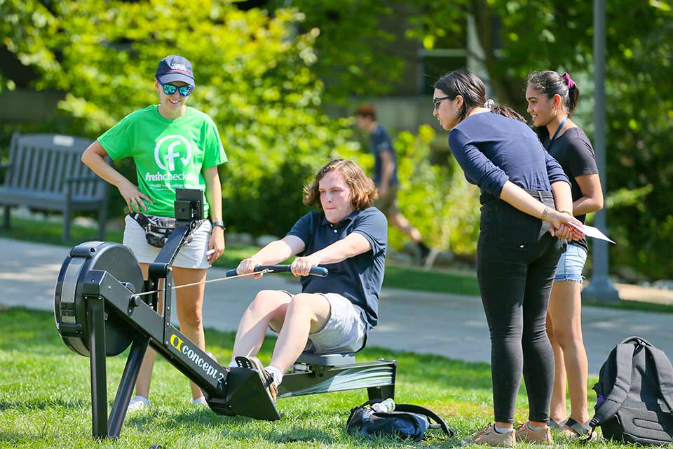 Students enjoying springtime together on the Brandeis campus